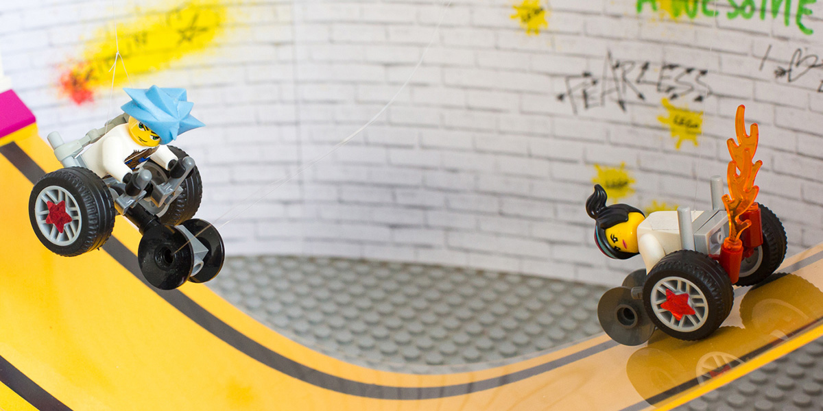#ToyLikeMe makeover image showing Lego wheelchair skate park featuring mini-figures with wheelchairs.