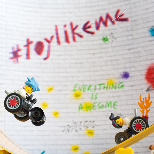 #ToyLikeMe makeover image showing Lego wheelchair skate park featuring mini-figures with wheelchairs.