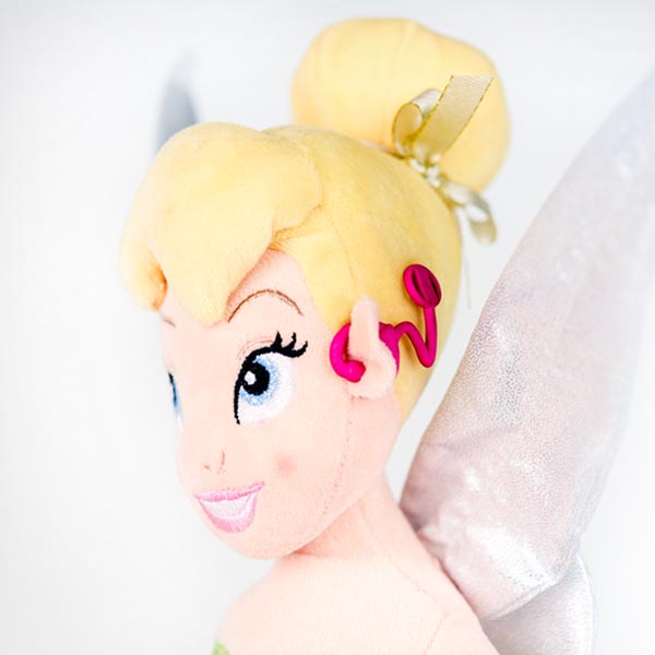 Plush Disney Tinkerbell doll rocking hot pink 3D printed cochlear implant.
