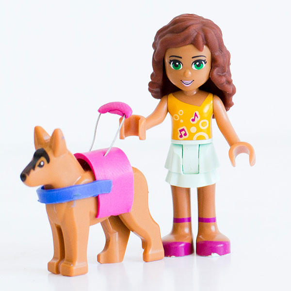 #ToyLikeMe makeover image showing a Lego Friends character with a guide dog.