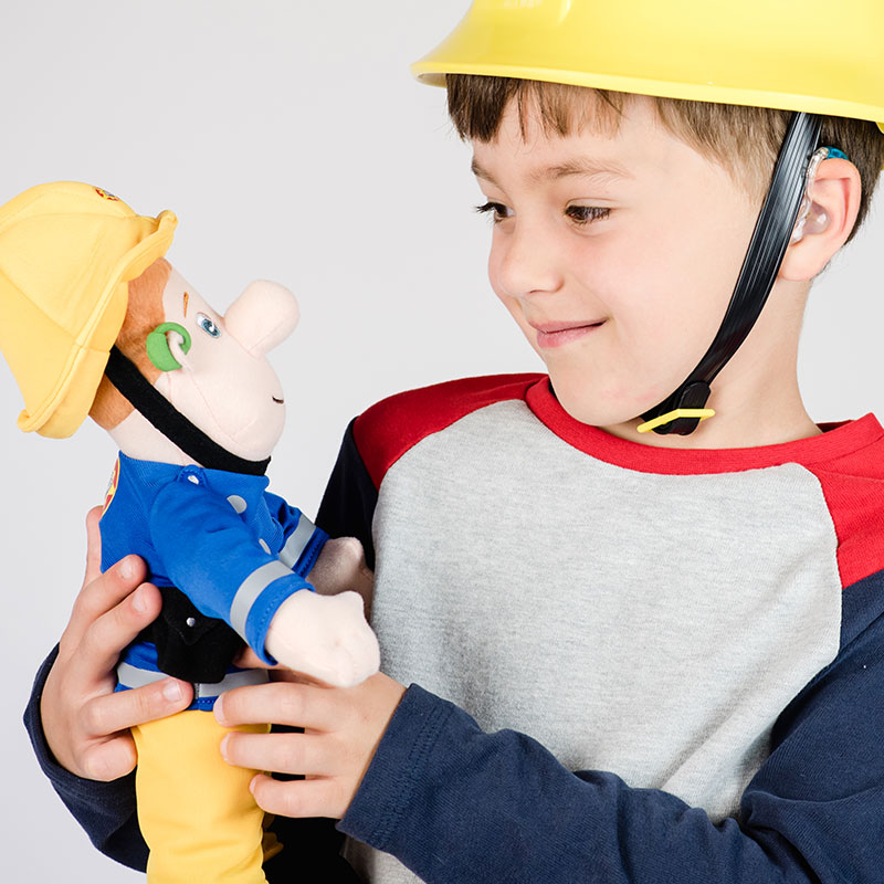 Image shows boy in fireman