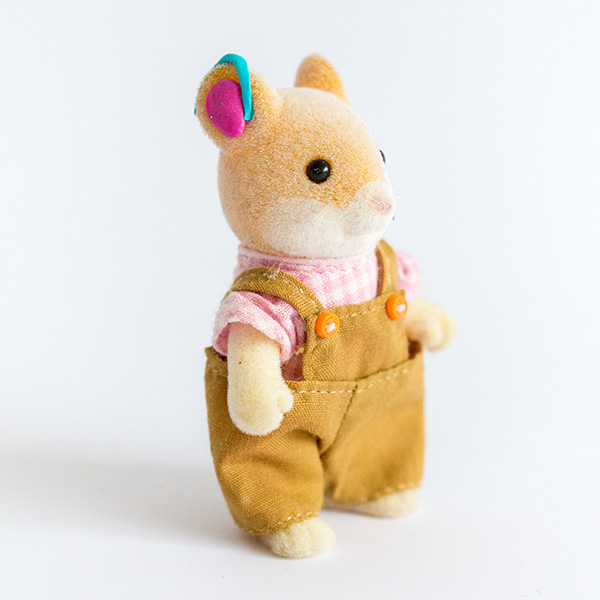 #ToyLikeMe makeover image showing Sylvanian Families mouse with a model hearing aid.
