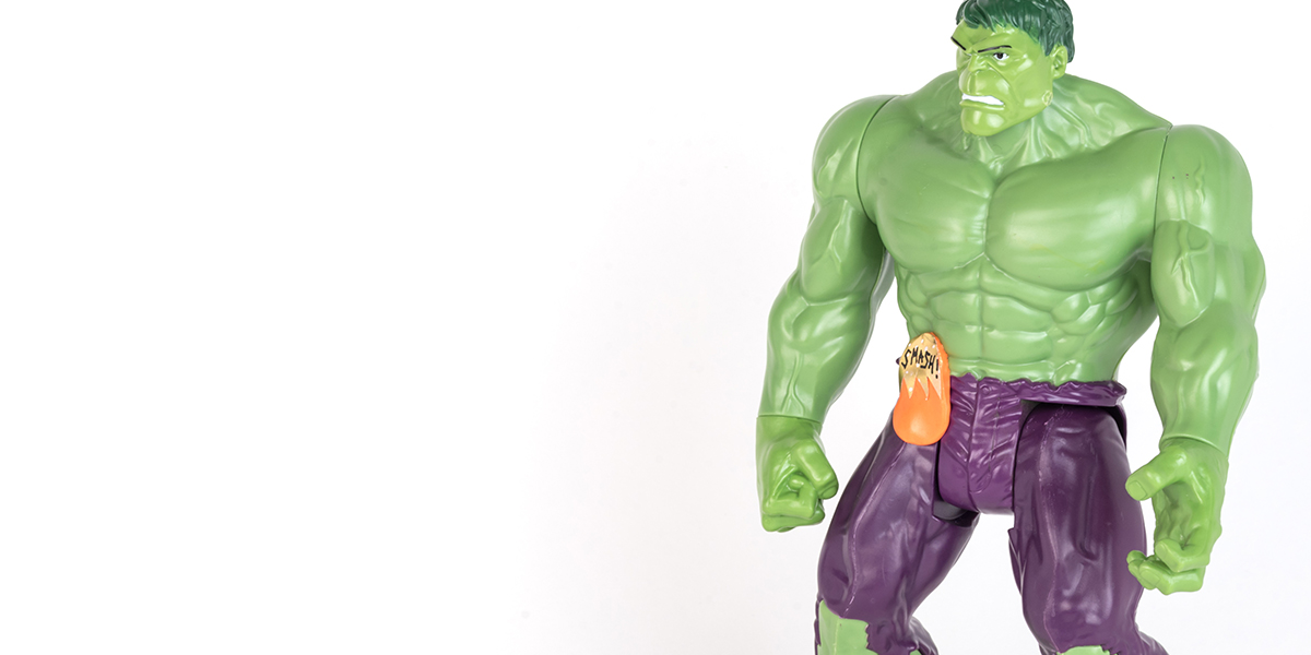#ToyLikeMe makeover image showing Hulk toy with orange model ostomy pouch.