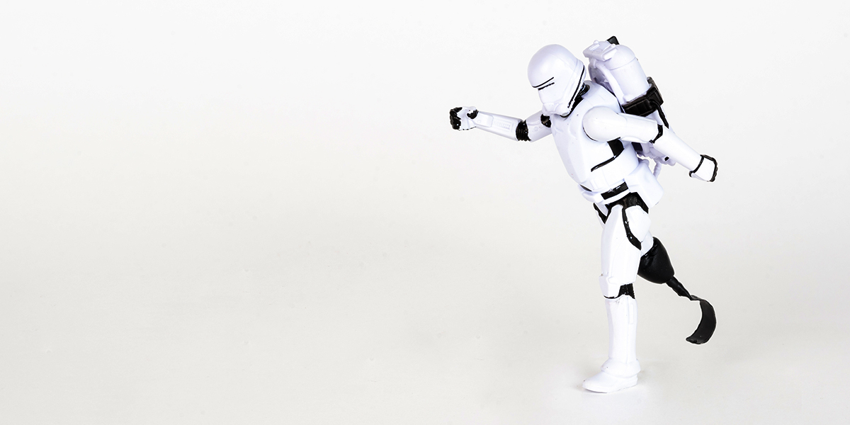 #ToyLikeMe makeover image showing Star Wars storm trooper with model prosthetic blade on one leg.