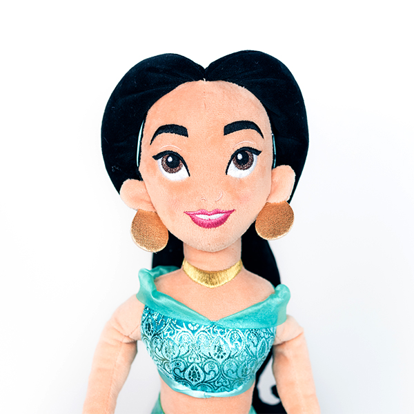 Plush Disney Jasmine doll with blue top, black hair and gold earrings.