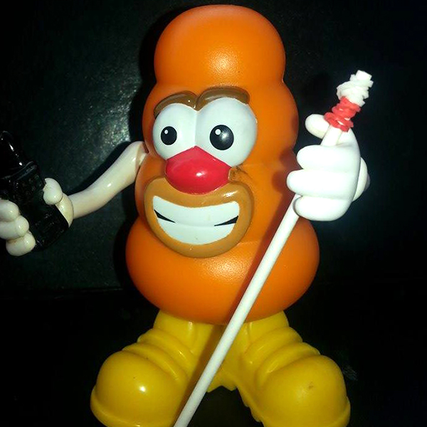 Community makeover image showing Mr Potato Head toy with model white cane.